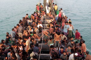 rohingya-migrants-sit-in-a-boat-data